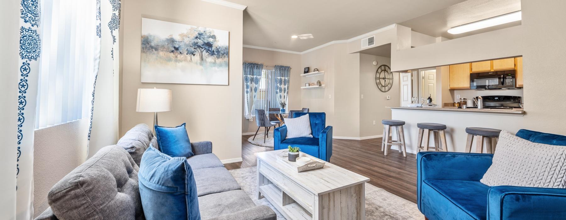 a living room with a couch and a table