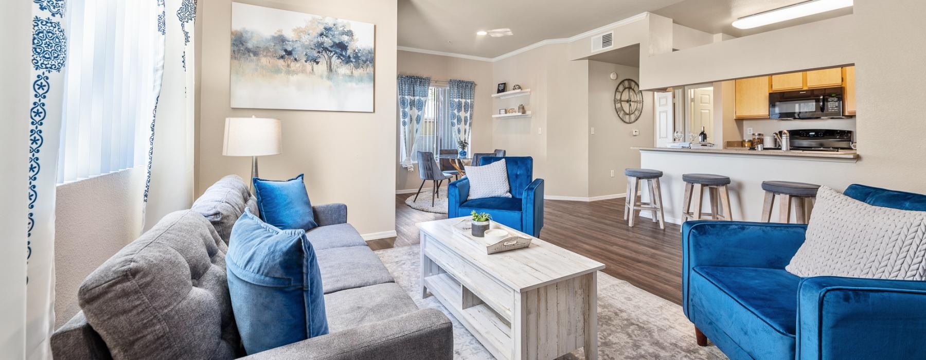 a living room with a couch and a table